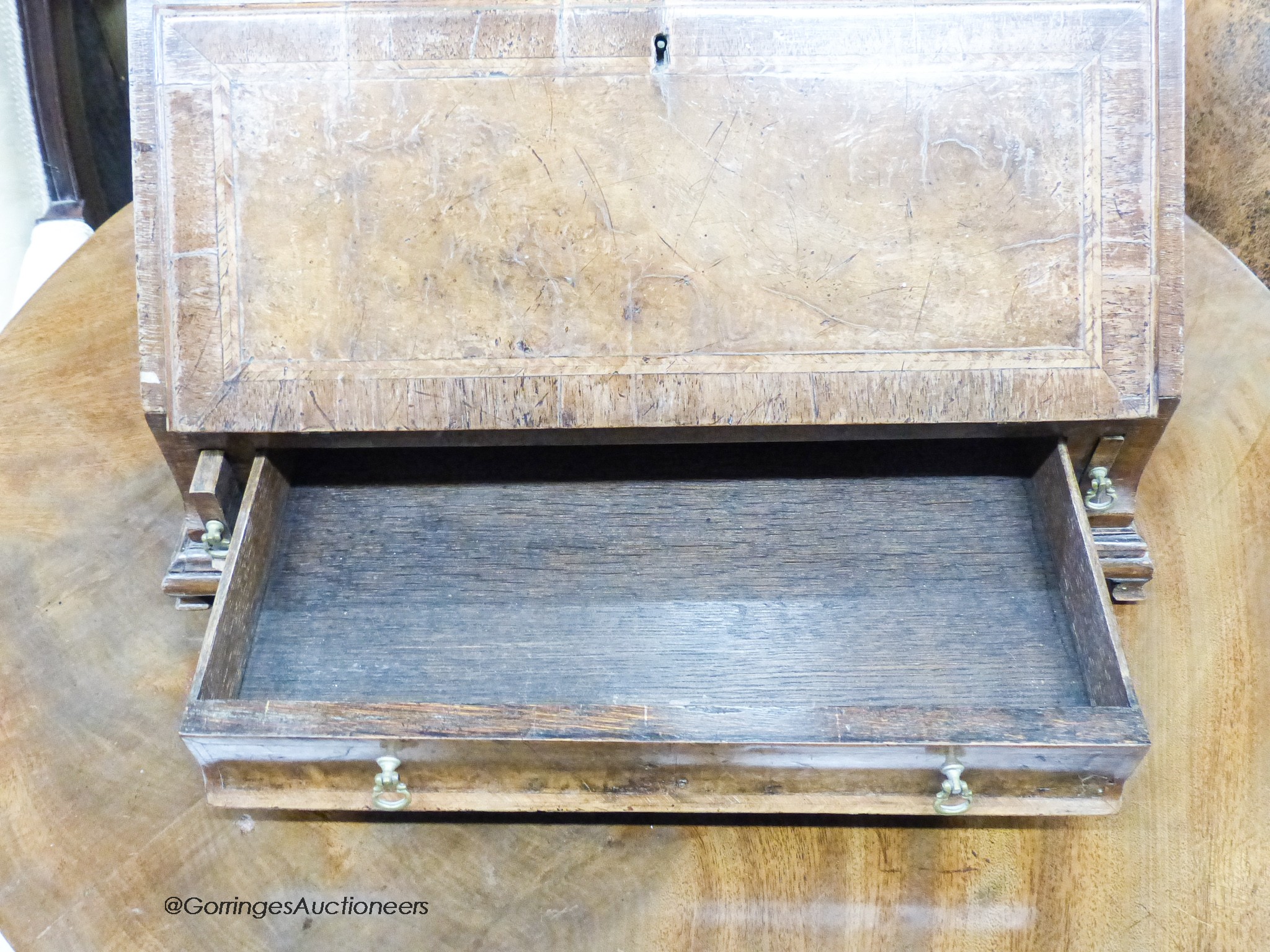 An 18th century style burr walnut toilet mirror with bureau base, width 39cm, depth 23cm, height 69cm